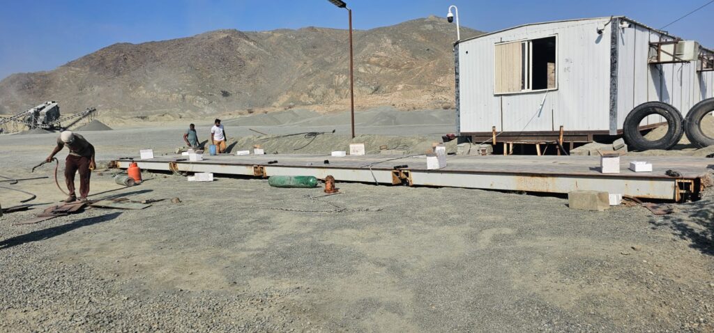 Industrial Scale Supplier Guide: Improving Accuracy, Compliance, and Efficiency with Test Weights 1 Weighbridge installation and test weight calibration at an industrial site in UAE - HIRS Global trusted industrial scale supplier serving UAE and Saudi Arabia